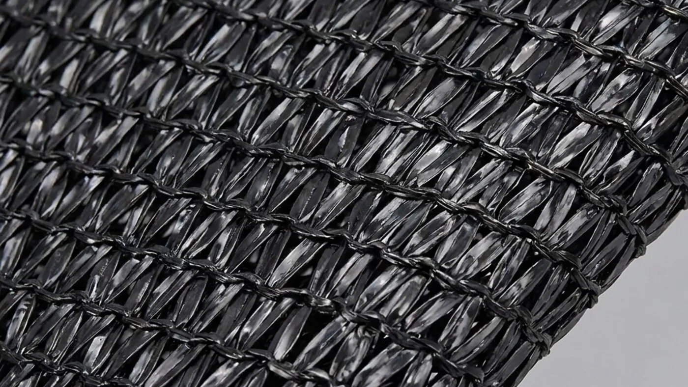 Close-up of knitted flat-wire shade cloth showing the knit density that sets its GSM and shade rate